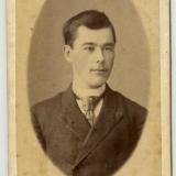 Фотография молодого человека в фотоателье А.П.Чернова, Екатеринодар, конец 19/начало 20 века